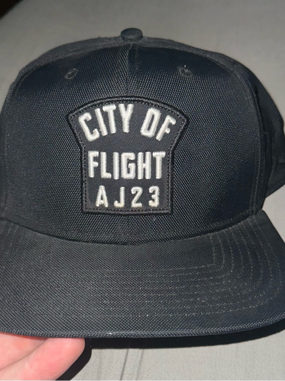 Jordan Black 'City of Flight AJ23' Snapback Hat